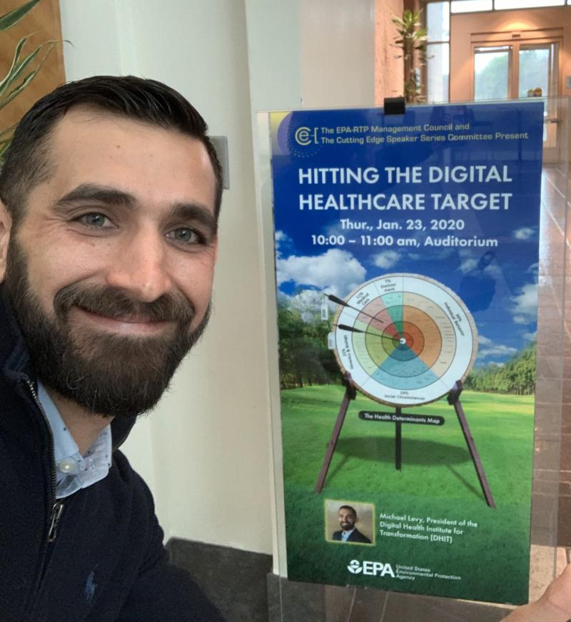 Michael Levy beside the EPA Cutting Edge Speaker Series poster